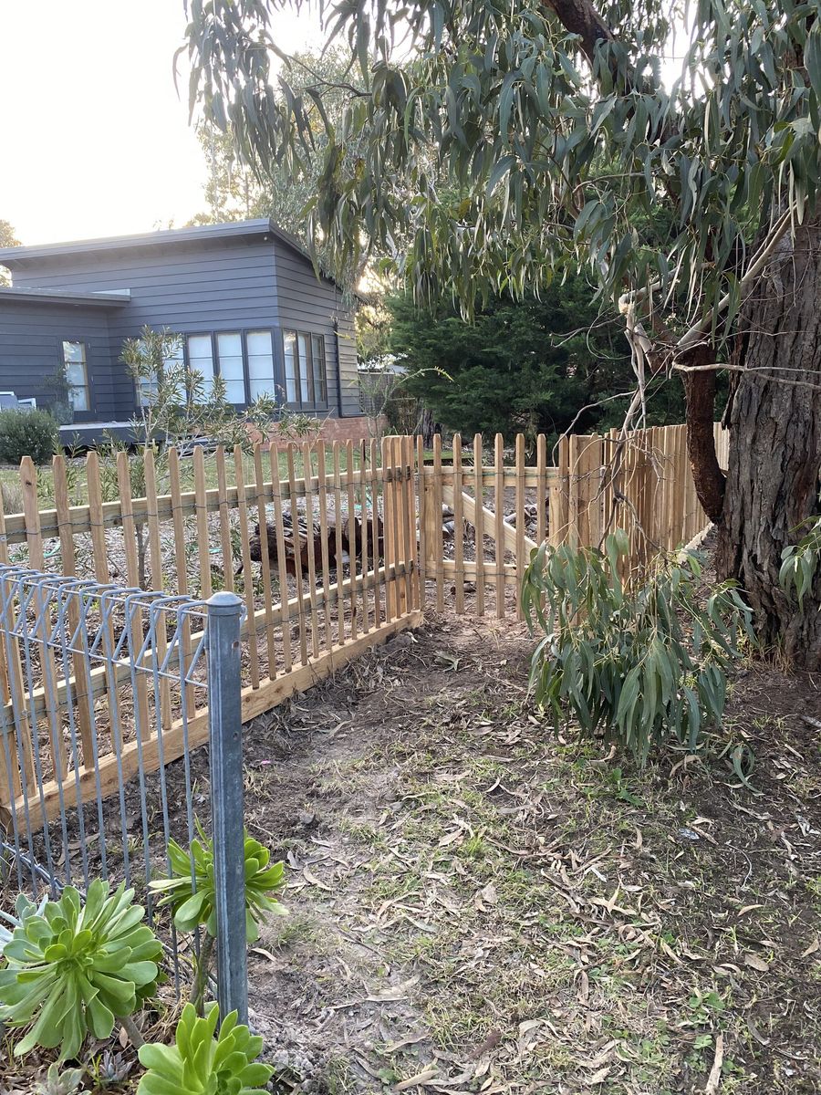 Wattle and wire with rails and cypress sleeper